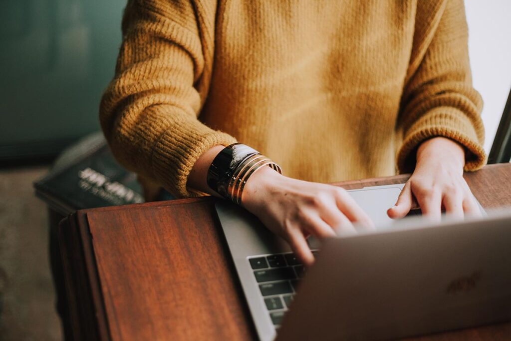 business owner using laptop computer